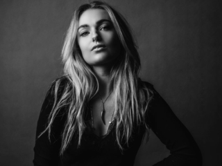 An example of a stunning black and white shot, done for a models book at her agency, by Loci Photography