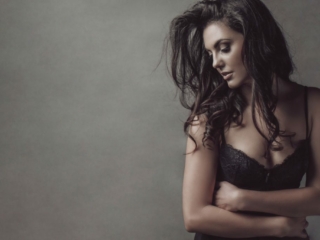 An example of a boudoir image from a bride intended to give to her groom as gift, by Loci Photography