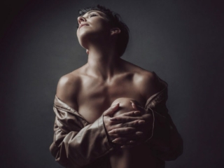 An example of boudoir photography done beautifully and professionally in studio, by Loci Photography