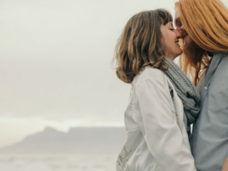 An example of couple photography done on the beach, photographed professionally by Loci Photography.
