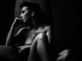 An example of a boudoir image from a bride intended to give to her groom as gift, by Loci Photography