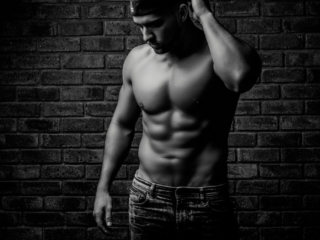 An example of professional fitness photography for men, done in studio by professional photographer Yolandi Jacobsz, of Loci Photography