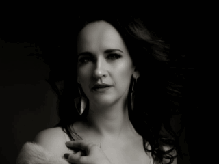 Stunning black and white boudoir shot of a classical boudoir image by Loci Photography