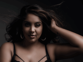 Fierce and empowering boudoir image taken in studio by Loci Photography.
