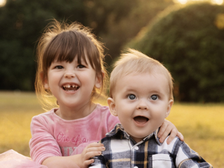 Siblings having a laugh during family photo sessions in Pretoria by Loci Photography