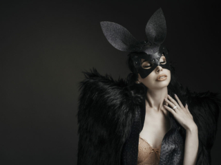 Image of woman in fur jacket and bunny mask for professional boudoir images done in Pretoria East by Loci Photography