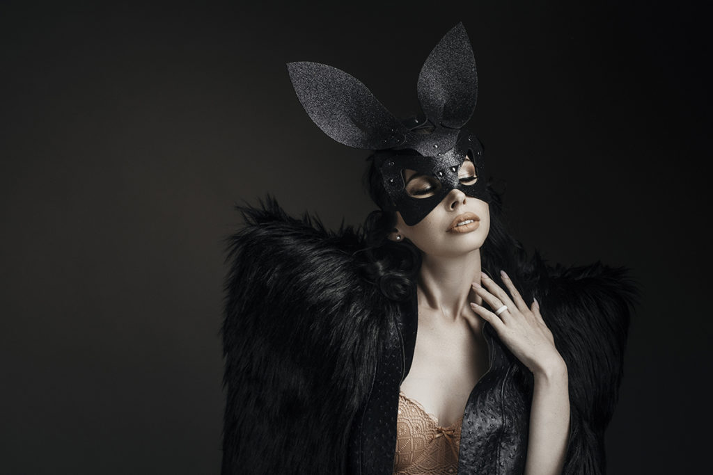 Image of woman in fur jacket and bunny mask for professional boudoir images done in Pretoria East by Loci Photography