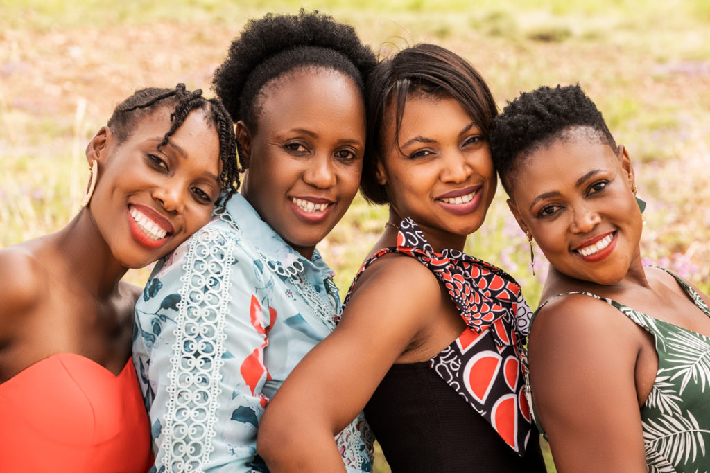 Image of smiling sisters during a family photoshoot in Hartbeespoort by Loci Photography