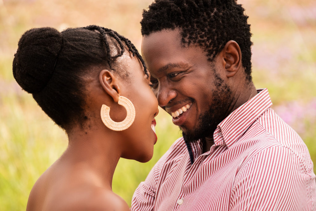 Image of smiling couples during a family photoshoot in Hartbeespoort by Loci Photography