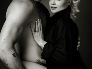 Black and white couple boudoir image taken in studio by photographer Yolandi Jacobsz of Loci Photography