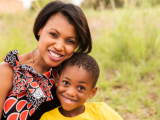 Image of smiling families during a family photoshoot in Hartbeespoort by Loci Photography