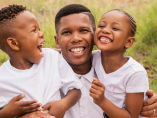 Smiling daddy &amp; kids during a family photoshoot done in Hartbeespoort by Loci Photography