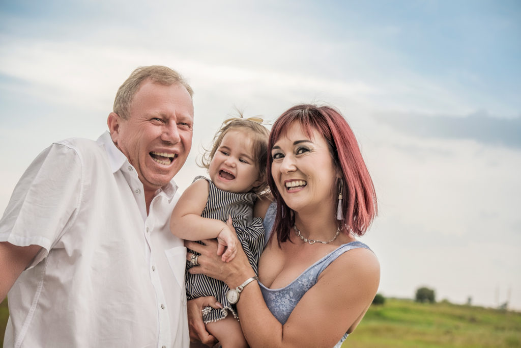 Image of grandparents playing with baby during family photography done on location in Kempton Park by Pretoria photographer Yolandi Jacobsz of Loci Photography