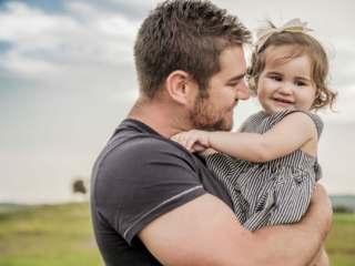 Image of daddy playing with baby during family photography done on location in Kempton Park by Pretoria photographer Yolandi Jacobsz of Loci Photography