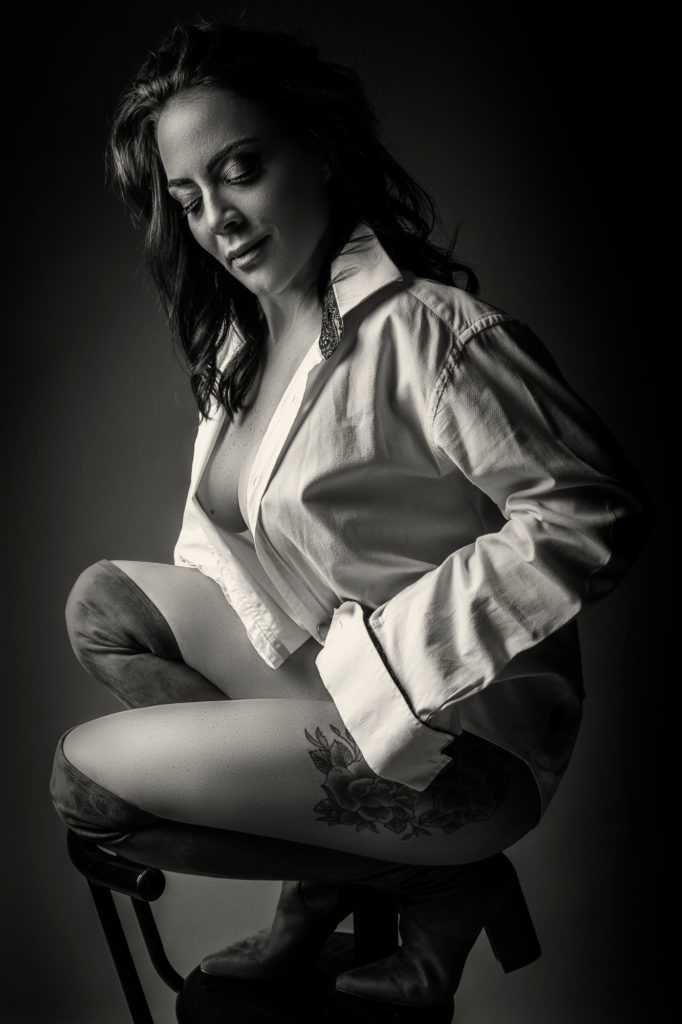 Black and white image of doing the ultimate professional boudoir experience in studio, by Loci Photography