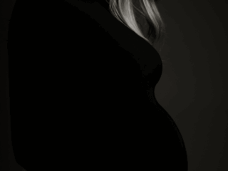 Classic maternity images taken in studio by Loci Photography.