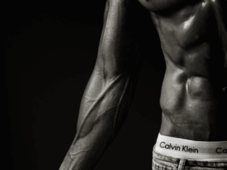 Doing professional fitness photography at the Loci photography studio Stunning black and white image of professional fitness photography done at the Loci photography studio in Pretoria