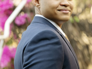 Image of young man in blue suit during his matric dance photoshoot by Loci Photography