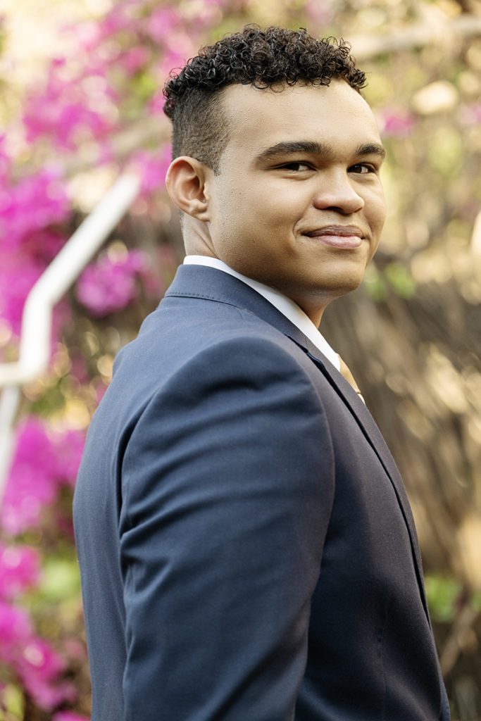 Image of young man in blue suit during his matric dance photoshoot by Loci Photography