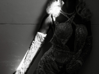 Black and white image of young woman in shimmering dress during her matric dance photoshoot by Loci Photography