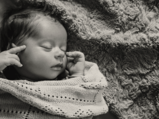 Newborn images on location by Loci Photography.