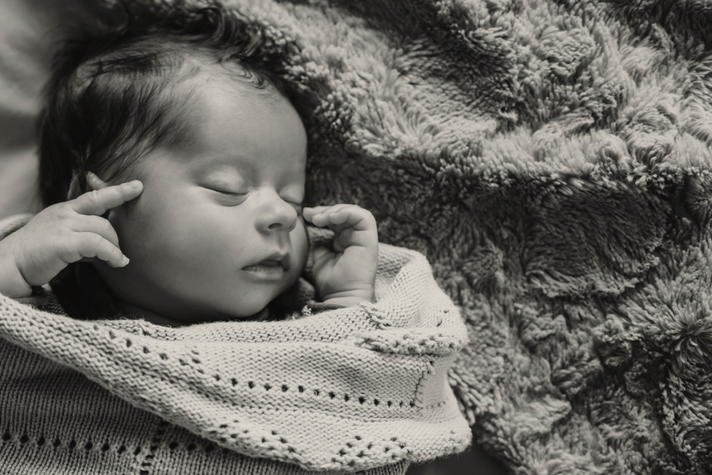 Newborn images on location by Loci Photography.