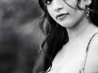 Black and white image of young woman during her matric dance photoshoot by Loci Photography