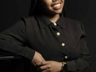 Portrait of woman smiling for corporate images captured professionally by Loci Photography