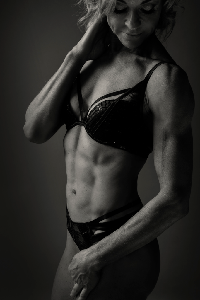 Professional fitness boudoir photography done in the Loci Photography studio.