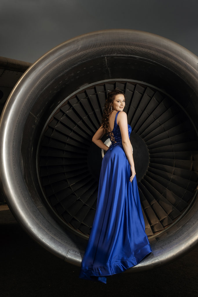 Image of girl in blue evening dress for a matric dance photoshoot done at Rand Airport in Germiston by Loci Photography