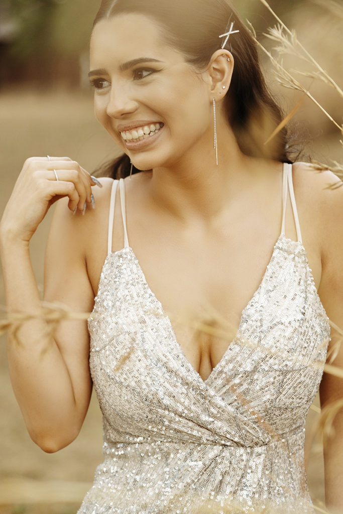 Image on location of girl in silver dress for her matric dance photoshoot by Loci Photography