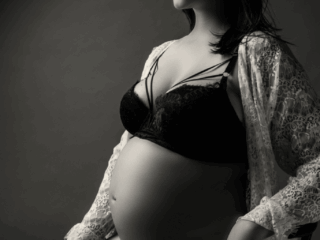 Moody maternities taken in studio by Loci Photography.