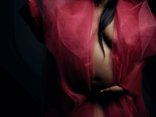 Stunning maternity images using the watermelon Nicolassi coat photographed by Loci Photography