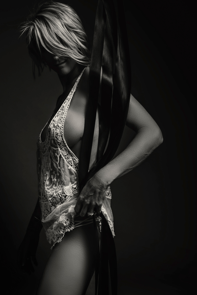 Moody image of combining stunning boudoir and portfolio shoots in the Loci Photography studio in Pretoria.