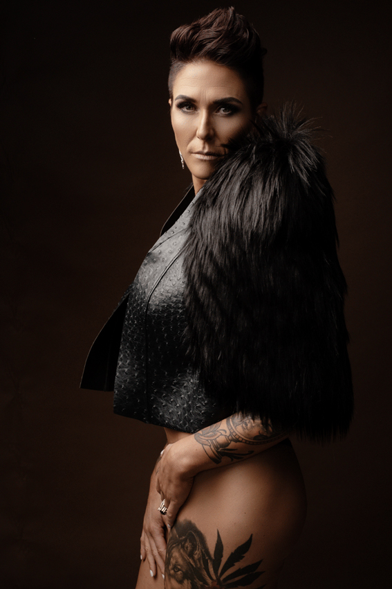Image of woman photographed in studio with short fur jacket from the Nicolassi clothing range photographed by Loci Photography