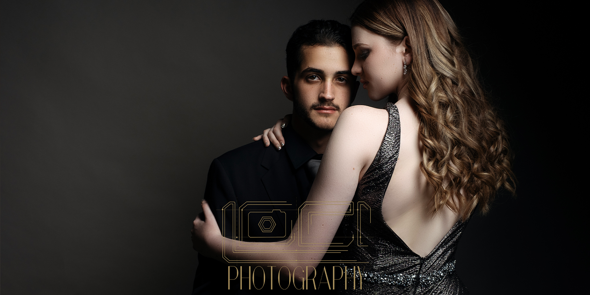 Blog header image for a stunning matric dance shoot with a couple shot in studio by Loci Photography