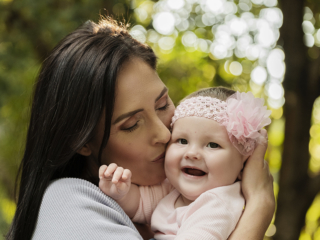 Laughing and smiling mommy and baby during their photoshoot with Loci Photography in Pretoria