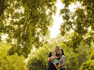 Laughing and smiling family members during their photoshoot with Loci Photography in Pretoria