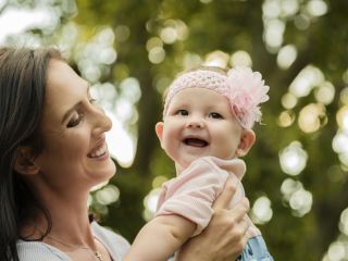 Laughing and smiling mommy and baby during their photoshoot with Loci Photography in Pretoria