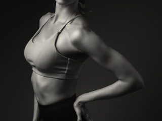 Stunning fitness photography done professionally by Loci Photography Black and white image of professional fitness photography done in studio by Loci Photography