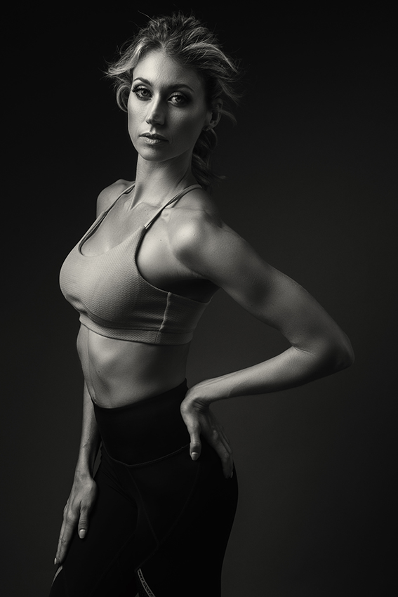 Black and white image of professional fitness photography done in studio by Loci Photography