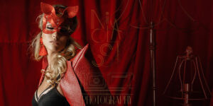 Blog header image for a blog on the Loci Photography website about red ideas for a boudoir shoot